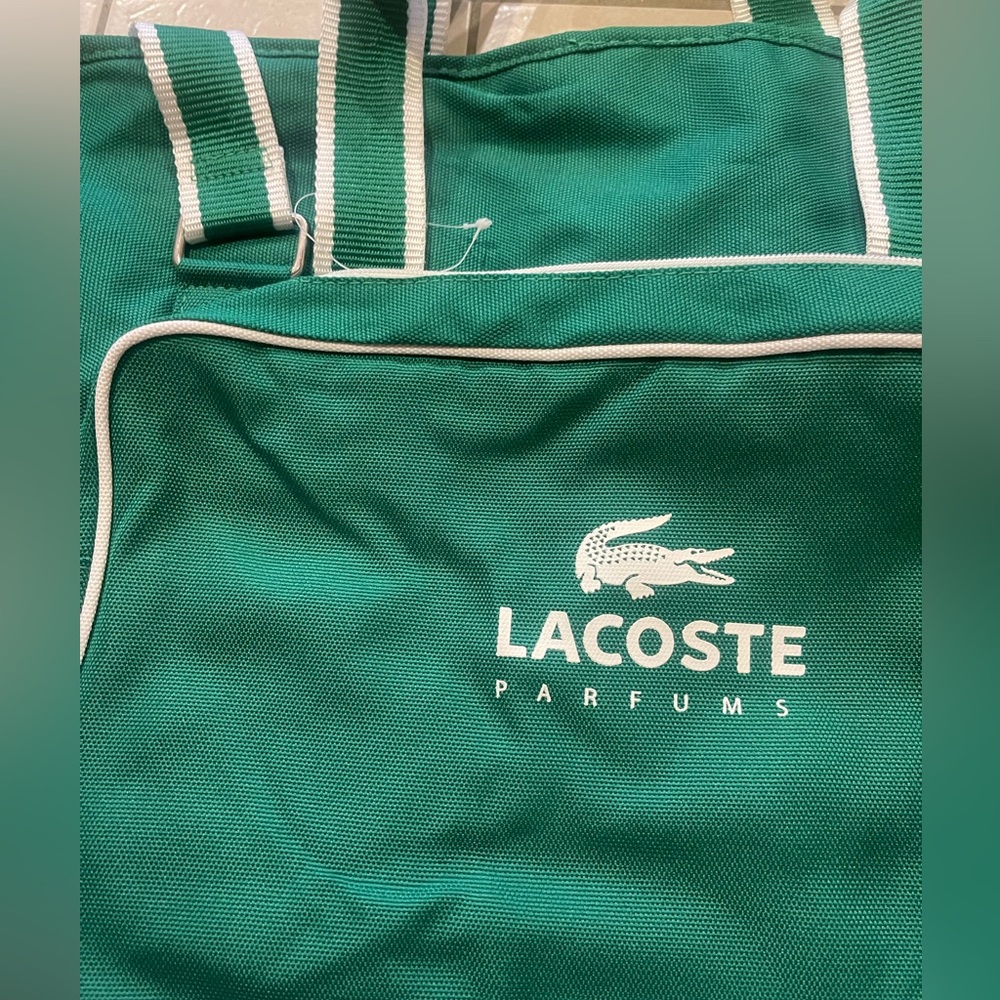 Lacoste Garment Traveling Bag.. Brand New